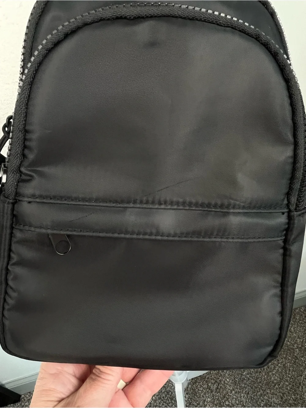 Gogo black nylon convertible strap mini crossbody sling bag.